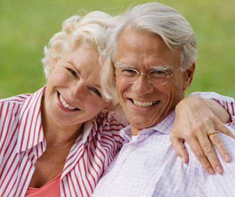 A couple with dental implants